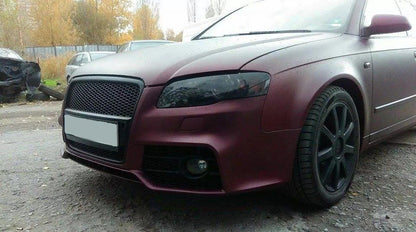 Предна броня за Audi A4 B7 8E (2004-2008) - S-Line Design с черна решетка с отвори за парктроник - висококачествен продукт за автомобил
